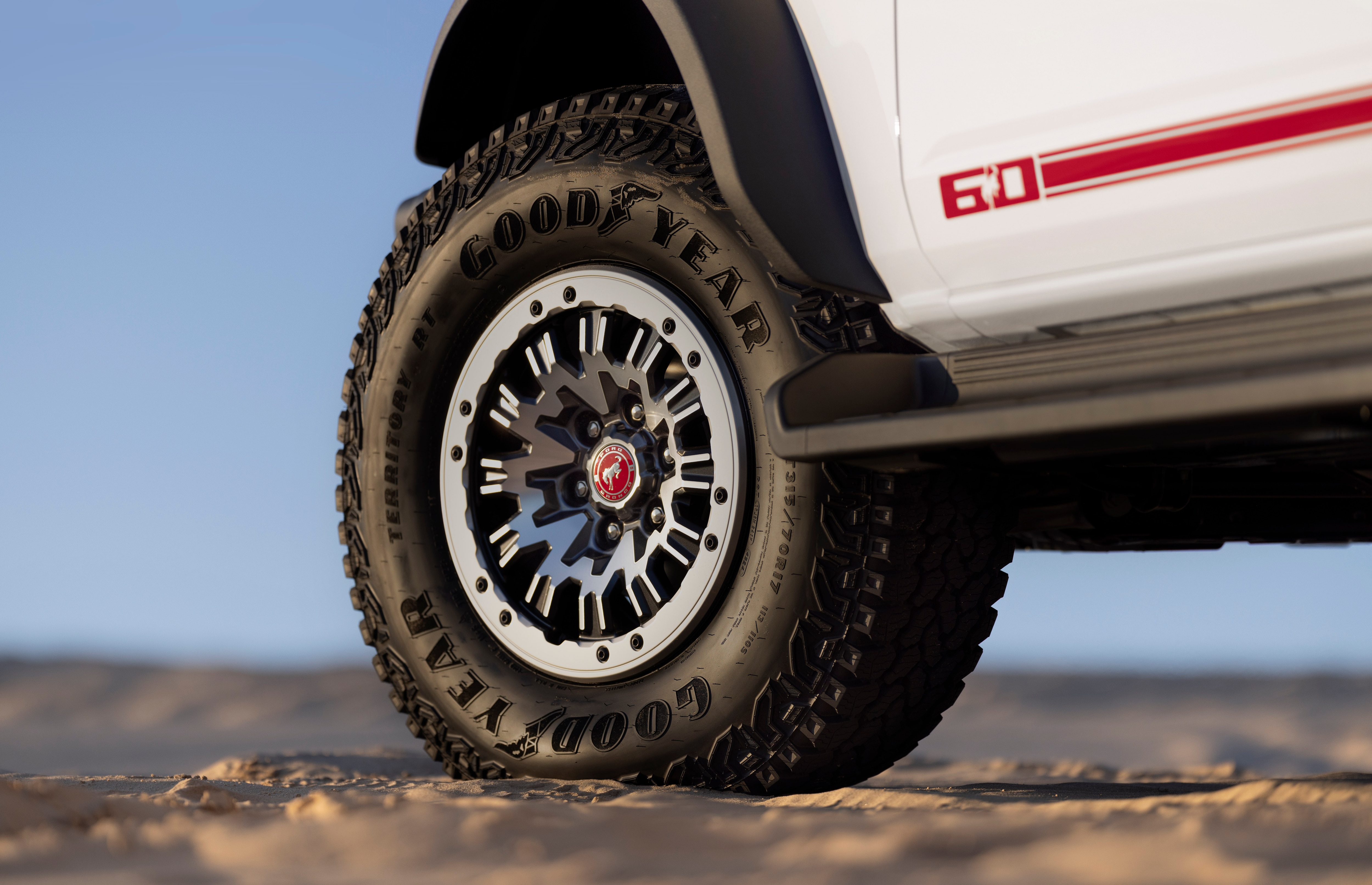 2026 Ford Bronco 60th Anniversary Package shown with close-up detail shot of tire. 